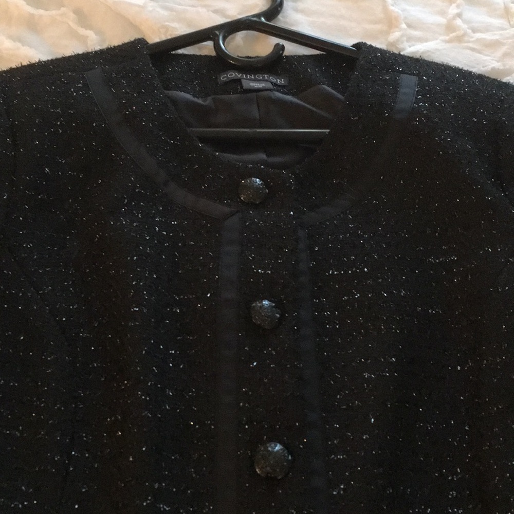 Two piece woman’s dress suit jacket and skirt